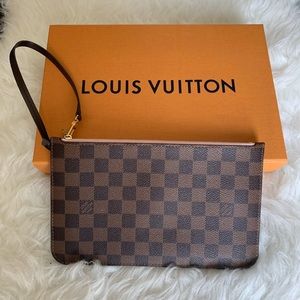 Authentic Louis Vuitton never full pouch